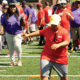 An athlete jumps over hurdles during the CSS Consumer Olympics.